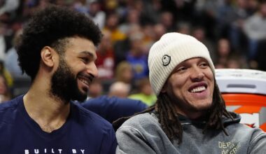 Feb 3, 2025; Denver, Colorado, USA; Denver Nuggets forward Aaron Gordon (32) and guard Jamal Murray (27) on the bench in the second half against the New Orleans Pelicans at Ball Arena. Mandatory Credit: Ron Chenoy-Imagn Images