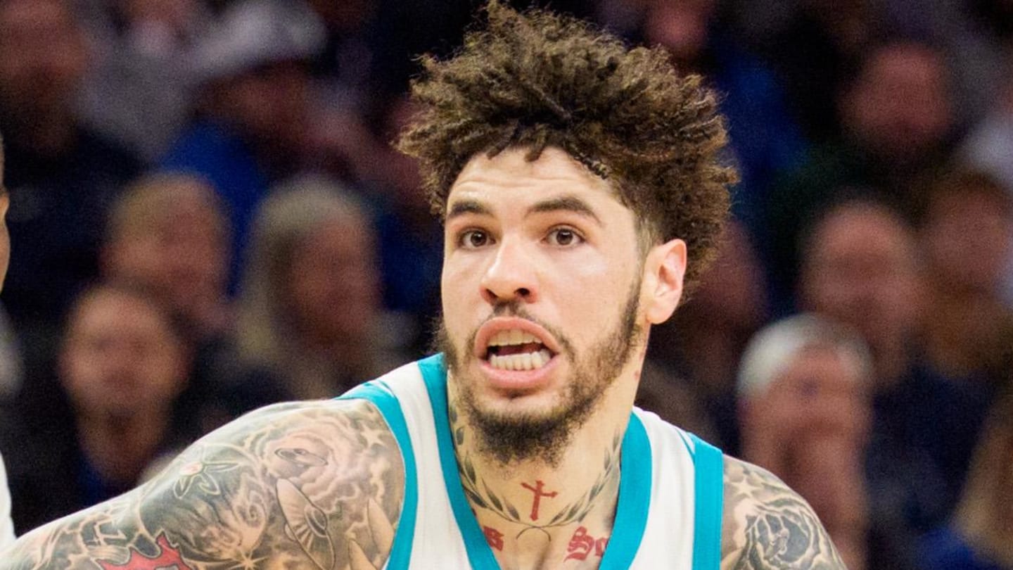 Apr 5, 2026; Minneapolis, Minnesota, USA; Charlotte Hornets guard LaMelo Ball (1) drives by Minnesota Timberwolves center Naz Reid (11) in the fourth quarter at Target Center. Mandatory Credit: Matt Blewett-Imagn Images