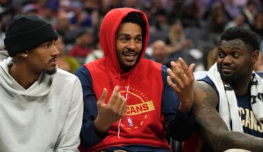 Apr 3, 2026; Sacramento, California, USA; New Orleans Pelicans guard Jordan Poole (center) talks with guard Dejounte Murray (left) and forward Zion Williamson (right) during the third quarter against the Sacramento Kings at Golden 1 Center. Mandatory Credit: Darren Yamashita-Imagn Images