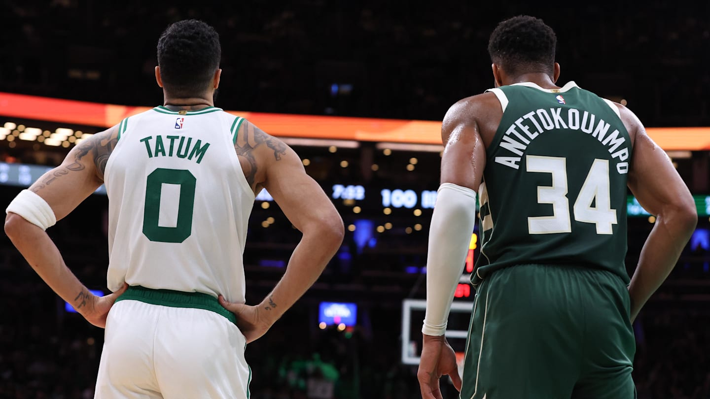 Oct 28, 2024; Boston, Massachusetts, USA; Boston Celtics forward Jayson Tatum (0) and Milwaukee Bucks forward Giannis Antetokounmpo (34) look on during the second half at TD Garden. Mandatory Credit: Paul Rutherford-Imagn Images