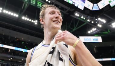 Milwaukee Bucks guard AJ Green (20) reacts after being doused with water following the game against the Brooklyn Nets at Fiserv Forum on April 10, 2026.