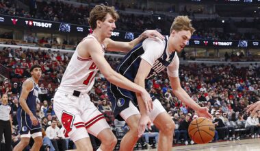 Jan 10, 2026; Chicago, Illinois, USA; Dallas Mavericks forward Cooper Flagg (32) defends against Chicago Bulls forward Matas Buzelis (14) during the first half at United Center. Mandatory Credit: Kamil Krzaczynski-Imagn Images