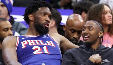 Mar 25, 2026; Philadelphia, Pennsylvania, USA; Philadelphia 76ers center Joel Embiid (21) and Tyrese Maxey (R) talk on the bench during the fourth quarter against the Chicago Bulls at Xfinity Mobile Arena. Mandatory Credit: Bill Streicher-Imagn Images