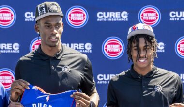 Jun 24, 2022; Detroit, Michigan, USA; Detroit Pistons head coach Dwane Casey (left) and general manager Troy Weaver (right) pose for photos with Jaden Ivey (23) and Jalen Duren (0): Raj Mehta-Imagn Images