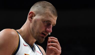 Apr 18, 2026; Denver, Colorado, USA; Denver Nuggets center Nikola Jokic (15) tends to a bloody nose during the first quarter against the Minnesota Timberwolvesin game one of the first round of the 2026 NBA Playoffs at Ball Arena. Mandatory Credit: Christopher Hanewinckel-Imagn Images