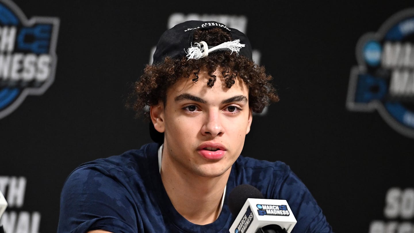 Illinois Fighting Illini guard Keaton Wagler (23) speaks in a press conference after defeating the Iowa Hawkeyes in an Elite Eight game of the South Regional of the men's 2026 NCAA Tournament at Toyota Center on March 28, 2026.
