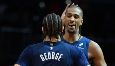 Mar 5, 2025; Washington, District of Columbia, USA; Washington Wizards forward Alex Sarr (20) celebrates with forward Kyshawn George (18) during the fourth quarter against the Utah Jazz at Capital One Arena. Mandatory Credit: Reggie Hildred-Imagn Images