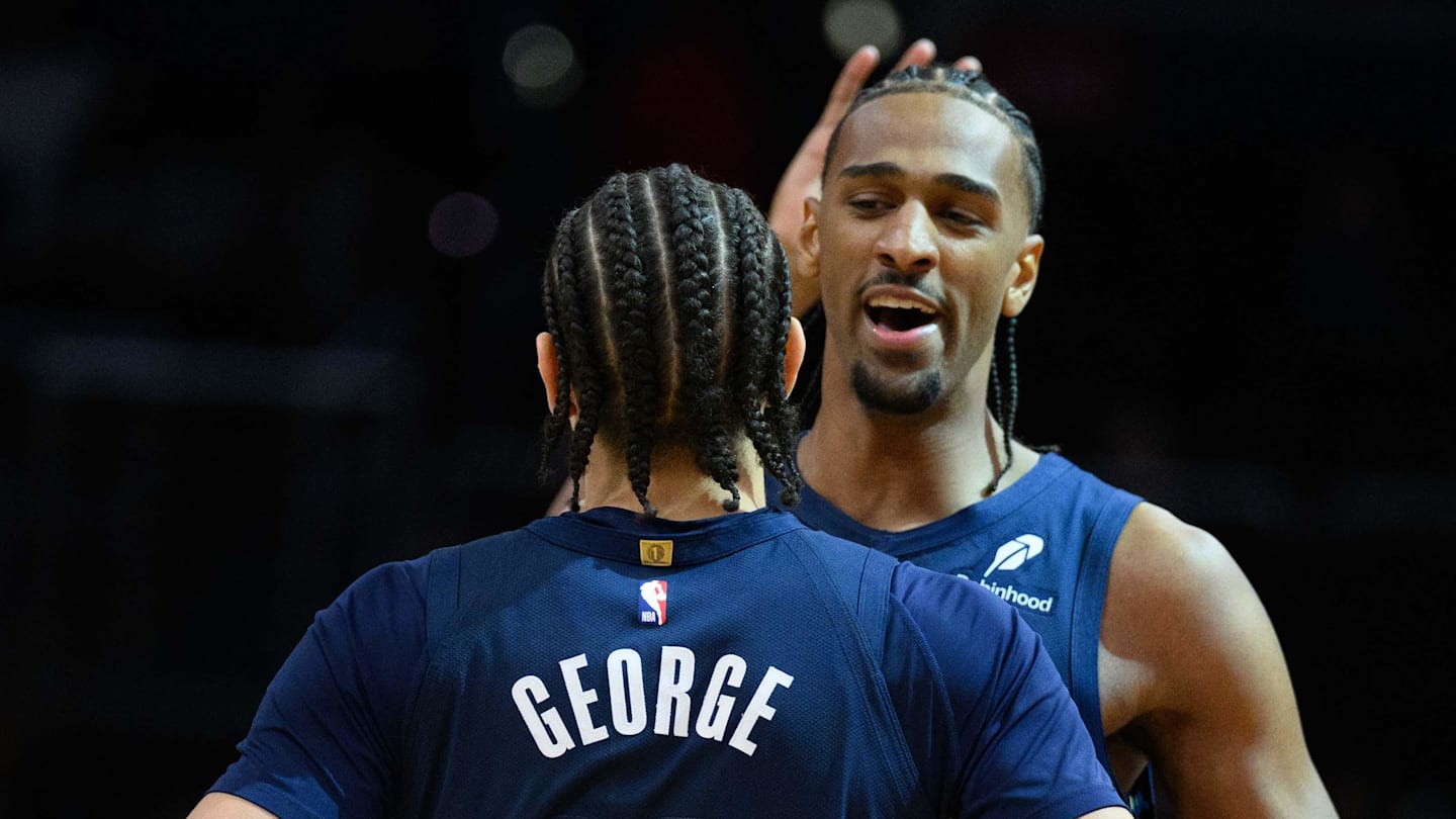 Mar 5, 2025; Washington, District of Columbia, USA; Washington Wizards forward Alex Sarr (20) celebrates with forward Kyshawn George (18) during the fourth quarter against the Utah Jazz at Capital One Arena. Mandatory Credit: Reggie Hildred-Imagn Images