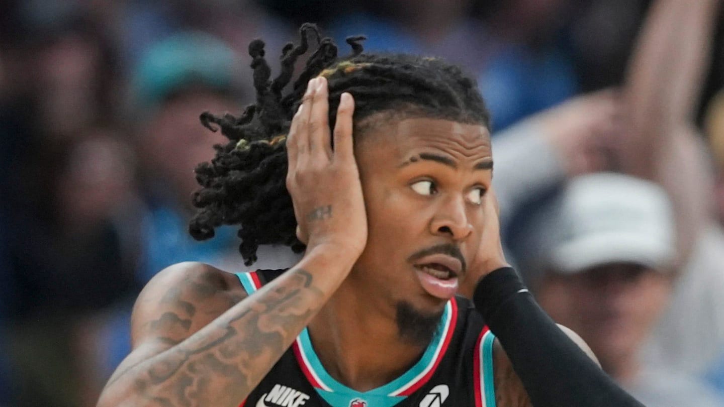 Grizzlies' Ja Morant (12) reacts after making a 3-pointer during the home opener against the New Orleans Pelicans at FedExForum on October 22, 2025.