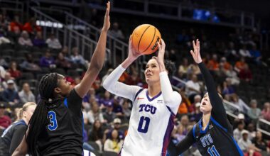 Mar 6, 2026; Kansas City, MO, USA; TCU Horned Frogs center Kennedy Basham (0) attempt a shot over BYU Cougars forward Bolanle Yussuf (3) during the first half at T-Mobile Center. Mandatory Credit: Nick Tre. Smith-Imagn Images