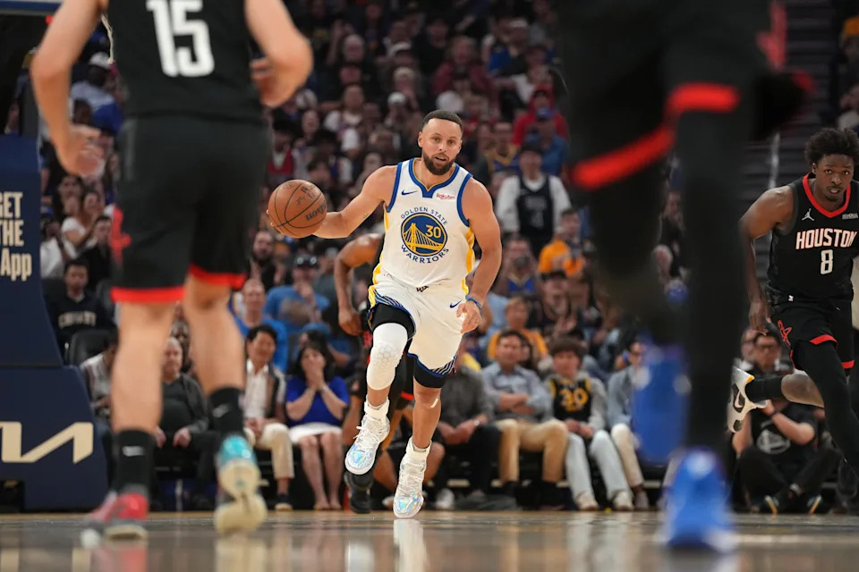 Apr 5, 2026; San Francisco, California, USA; Golden State Warriors guard Stephen Curry (30) dribbles the ball against the Houston Rockets in the second quarter at the Chase Center. Mandatory Credit: Cary Edmondson-Imagn Images