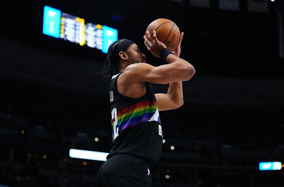 Apr 10, 2026; Denver, Colorado, USA; Denver Nuggets forward Zeke Nnaji (22) lines up three point basket in the fourth quarter against the Oklahoma City Thunder at Ball Arena. Mandatory Credit: Ron Chenoy-Imagn Images
