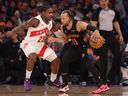 Jalen Brunson of the New York Knicks dribbles the ball against Jamal Shead of the Toronto Raptors during the first quarter at Madison Square Garden on April 10, 2026 in New York City.