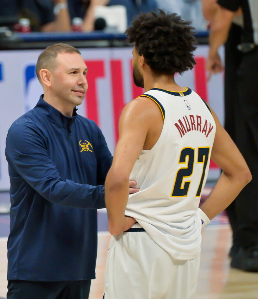 Denver Nuggets Head Coach David Adelman has a chat will Denver Nuggets guard Jamal Murray (27) in the third quarter of the first game of the first round of the NBA Championships at Ball Arena on Saturday, April 18, 2026. The Nuggets defeated the Timberwolves 116-105. (The Gazette, Jerilee Bennett)