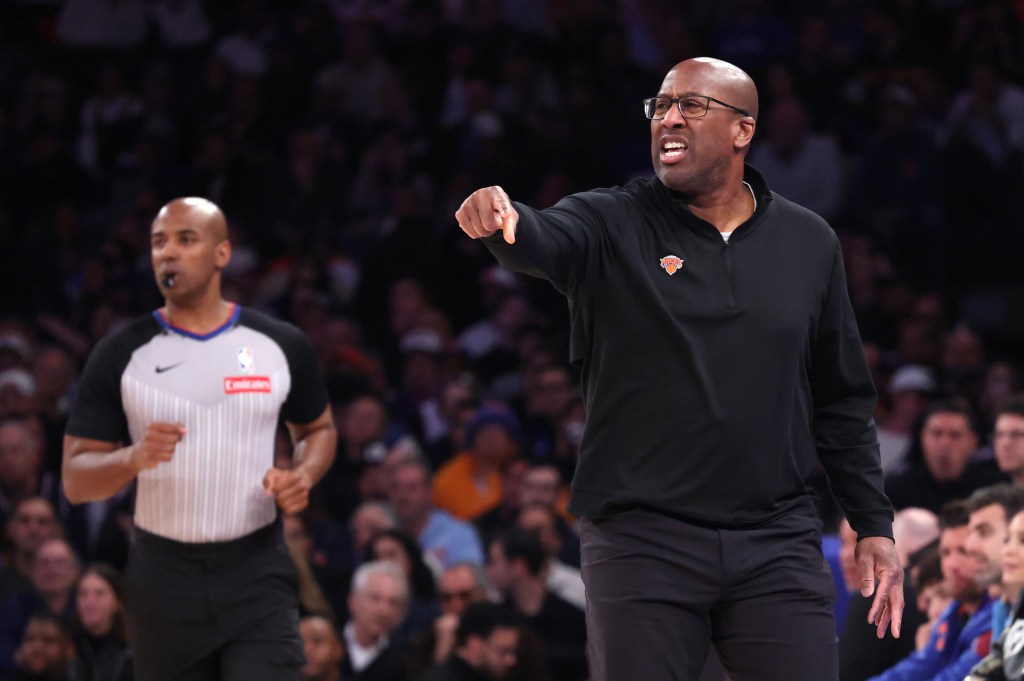 New York Knicks head coach Mike Brown reacts on the baseline during the first quarter.