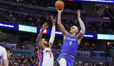 Paolo Banchero shooting against Detroit Pistons forward Paul Reed during the Orlando Magic's 123-107 NBA win at Kia Center on April 6, 2026.