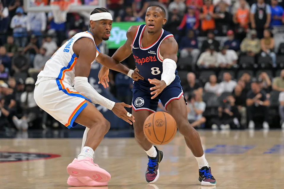 Apr 8, 2026; Inglewood, California, USA; Oklahoma City Thunder guard Shai Gilgeous-Alexander (2) defends Los Angeles Clippers guard Kris Dunn (8) in the first half at Intuit Dome. Mandatory Credit: Jayne Kamin-Oncea-Imagn Images
