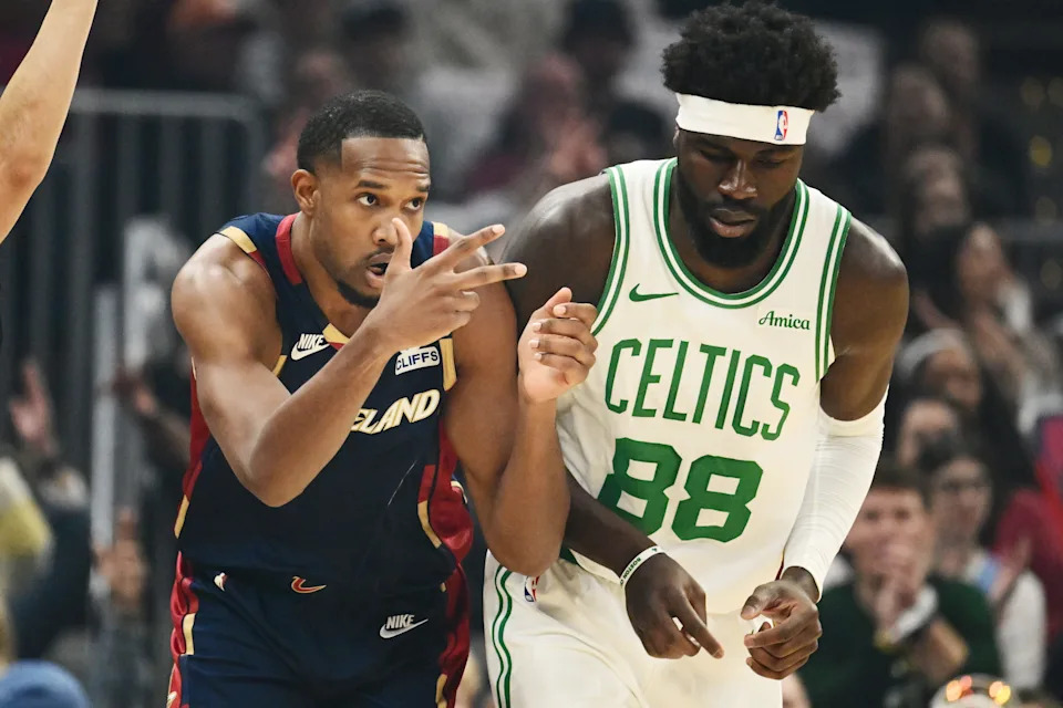 Cavaliers center Evan Mobley celebrates after hitting a 3-pointer against Boston Celtics center Neemias Queta in the first quarter, March 8, 2026, in Cleveland.