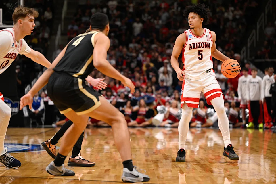 Mar 28, 2026; San Jose, CA, USA; Arizona Wildcats guard Brayden Burries (5) dribbles the ball against the Purdue Boilermakers in the first half during an Elite Eight game of the West Regional of the men's 2026 NCAA Tournament at SAP Center. Mandatory Credit: Eakin Howard-Imagn Images
