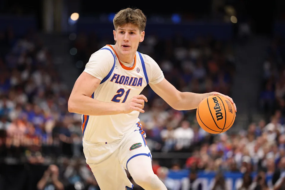 Mar 20, 2026; Tampa, FL, USA; Florida Gators forward/center Alex Condon (21) drives the ball in the first half against the Prairie View A&M Panthers during a first round game of the men's 2026 NCAA Tournament at Benchmark International Arena. Mandatory Credit: Nathan Ray Seebeck-Imagn Images