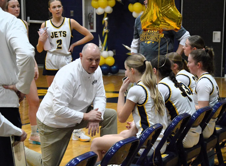 Acting Airport girls basketball coach Luke Baker talks to his team during a 65-22 victory over Ann Arbor Pioneer on Thursday, Feb. 26, 2026.