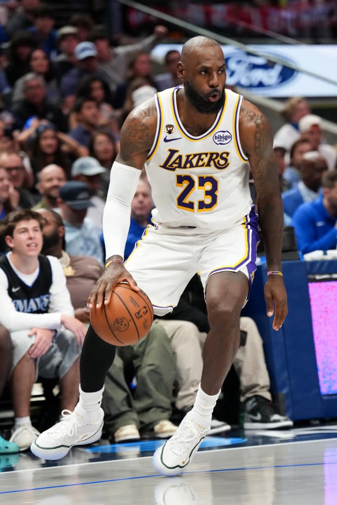 LeBron James of the Los Angeles Lakers handles the ball during the game against the Dallas Mavericks. NBAE via Getty Images