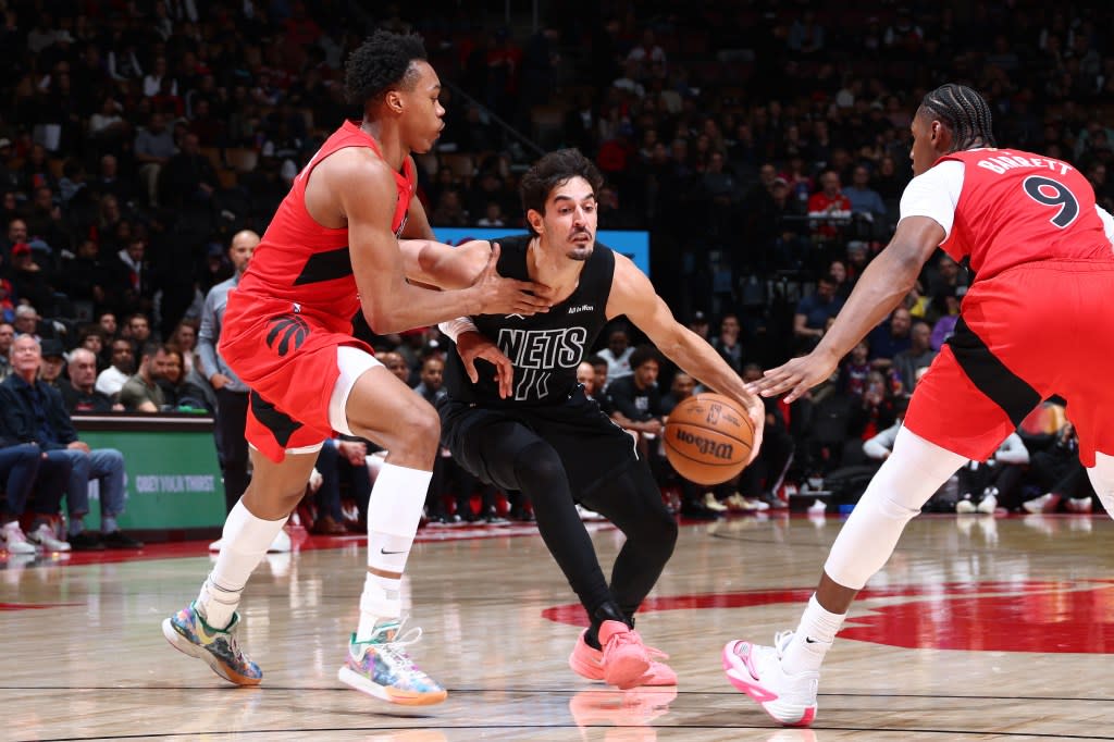 Ben Saraf of the Brooklyn Nets handles the ball during the game against the Toronto Raptors on April 12, 2026 at the Scotiabank Arena in Toronto, Ontario, Canada. NBAE via Getty Images
