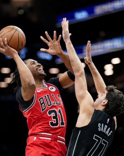Jaden Ivey #31 of the Chicago Bulls goes to the basket as Ben Saraf #77 of the Brooklyn Nets defends in the first half at Barclays Center on February 09, 2026 in New York City. 