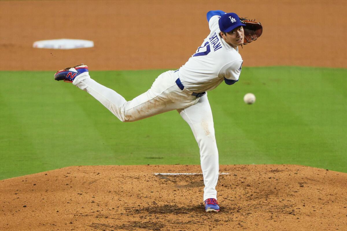 Dodgers pitcher Shohei Ohtani delivers during the third inning of a 4-1 win over the Cleveland Guardians.