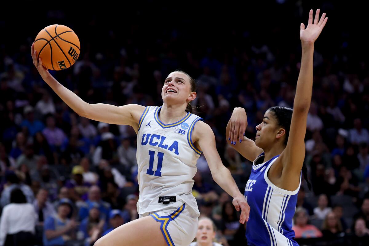 Sacramento, CA - March 29: UCLA Bruins guard Gabriela Jaquez (11) goes to the basket.