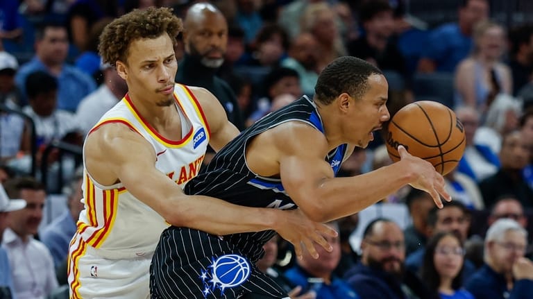 Atlanta Hawks guard Dyson Daniels, knocks the ball out of...