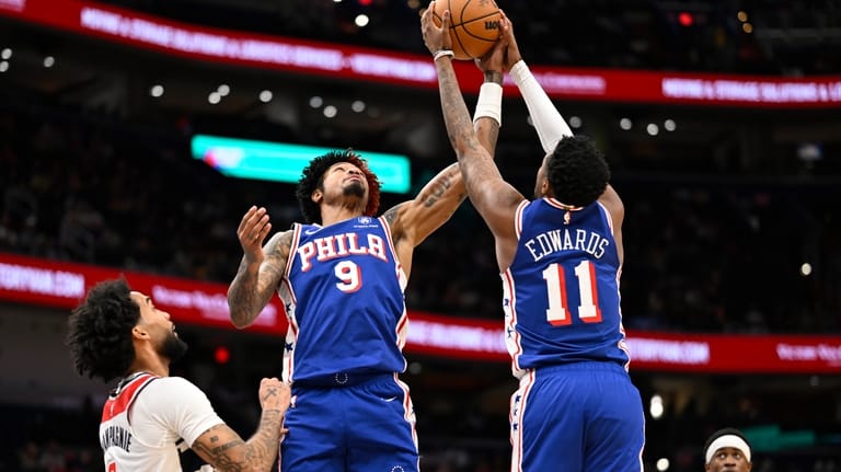 Philadelphia 76ers guard Kelly Oubre Jr. (9) and 76ers forward...