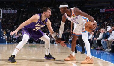 OKLAHOMA CITY, OK - NOVEMBER 12: Shai Gilgeous-Alexander #2 of the Oklahoma City Thunder looks to pass the ball as Luka Doncic #77 of the Los Angeles Lakers plays defense during the game on November 12, 2025 at Paycom Center in Oklahoma City, Oklahoma. NOTE TO USER: User expressly acknowledges and agrees that, by downloading and or using this photograph, User is consenting to the terms and conditions of the Getty Images License Agreement. Mandatory Copyright Notice: Copyright 2025 NBAE (Photo by Joe Murphy/NBAE via Getty Images)