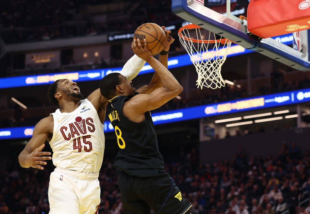Donovan Mitchell blocks the shot by De’Anthony Melton during the second quarter. Kelley L Cox-Imagn Images