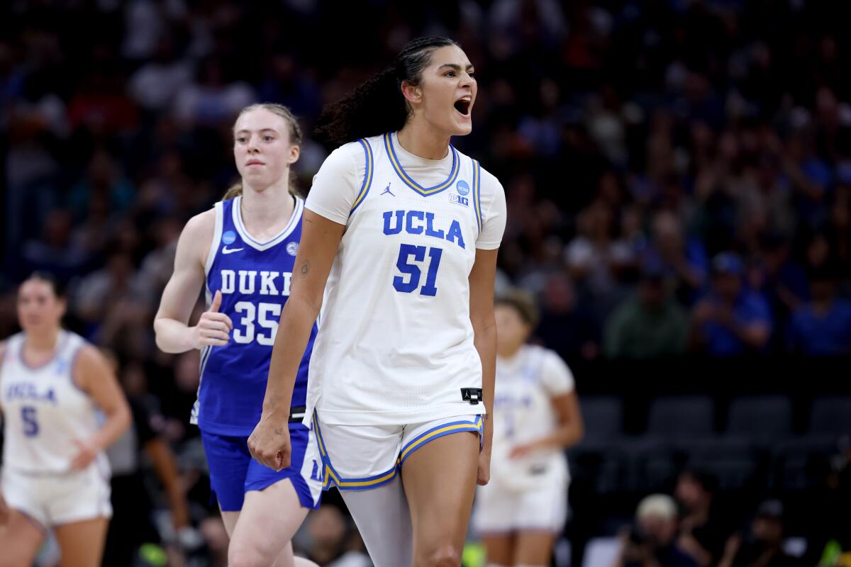UCLA center Lauren Betts celebrates during a win over Duke in the Elite Eight.