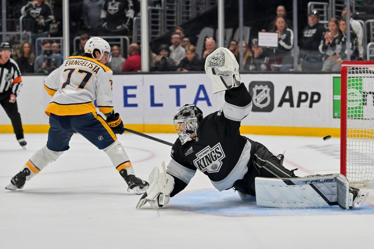 Nashville Predators forward Luke Evangelista scores the winning goal past Kings goaltender Darcy Kuemper.