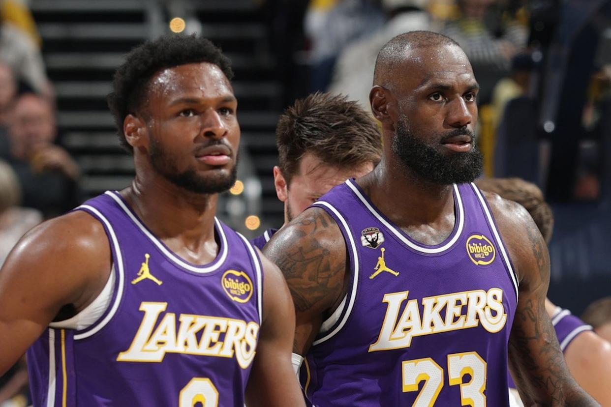 Bronny James #9 and LeBron James #23 of the Los Angeles in March 2026.Credit: Jeff Haynes/NBAE via Getty