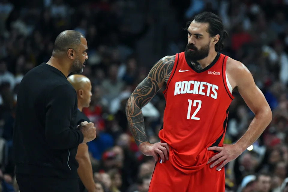 Houston Rockets center Steven Adams (12) talks with head coach Ime UdokaChristopher Hanewinckel-Imagn Images