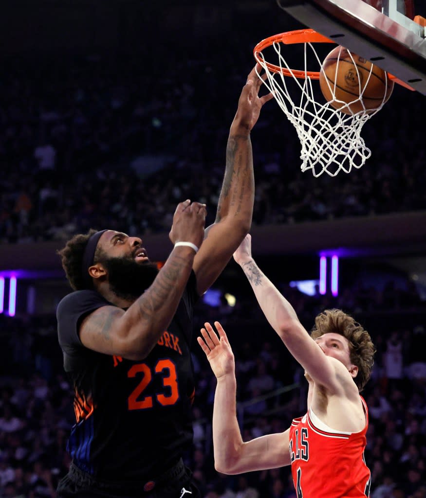 Center Mitchell Robinson of the New York Knicks puts up a shot during the first half at Madison Square Garden. Jason Szenes for the New York Post