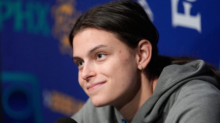 UCLA forward Gabriela Jaquez (11) speaks during a news conference...