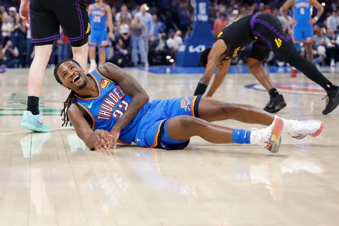 Apr 2, 2026; Oklahoma City, Oklahoma, USA; Oklahoma City Thunder guard Cason Wallace (22) laughs after a diving play against the Los Angeles Lakers during the second half at Paycom Center. Mandatory Credit: Alonzo Adams-Imagn Images