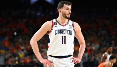 INDIANAPOLIS, INDIANA - APRIL 04: Alex Karaban #11 of the Connecticut Huskies takes a breather in the second half against the Illinois Fighting Illini in the Final Four of the 2026 NCAA Men's Basketball Tournament at Lucas Oil Stadium on April 04, 2026 in Indianapolis, Indiana. (Photo by Brett Wilhelm/NCAA Photos via Getty Images)