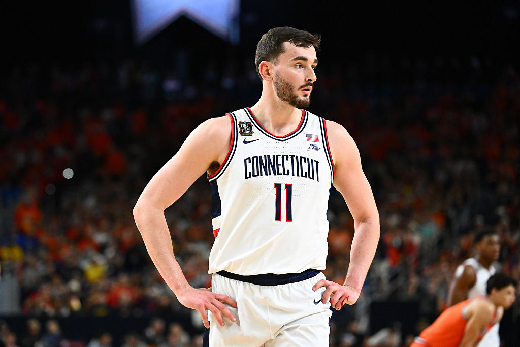 INDIANAPOLIS, INDIANA - APRIL 04: Alex Karaban #11 of the Connecticut Huskies takes a breather in the second half against the Illinois Fighting Illini in the Final Four of the 2026 NCAA Men's Basketball Tournament at Lucas Oil Stadium on April 04, 2026 in Indianapolis, Indiana. (Photo by Brett Wilhelm/NCAA Photos via Getty Images)