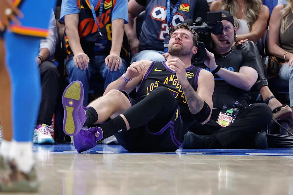 Apr 2, 2026; Oklahoma City, Oklahoma, USA; Los Angeles Lakers guard Luka Doncic (77) falls to the court during a play against the Oklahoma City Thunder during the third quarter at Paycom Center. Mandatory Credit: Alonzo Adams-Imagn Images