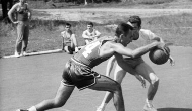 White draft Cousy NBA-record 19 assists; Abdul-Aziz born