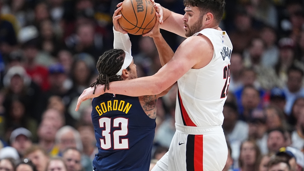 Jokic's 35 points, 13 rebounds, 13 assists help the Nuggets get past the Trail Blazers 137-132 in OT