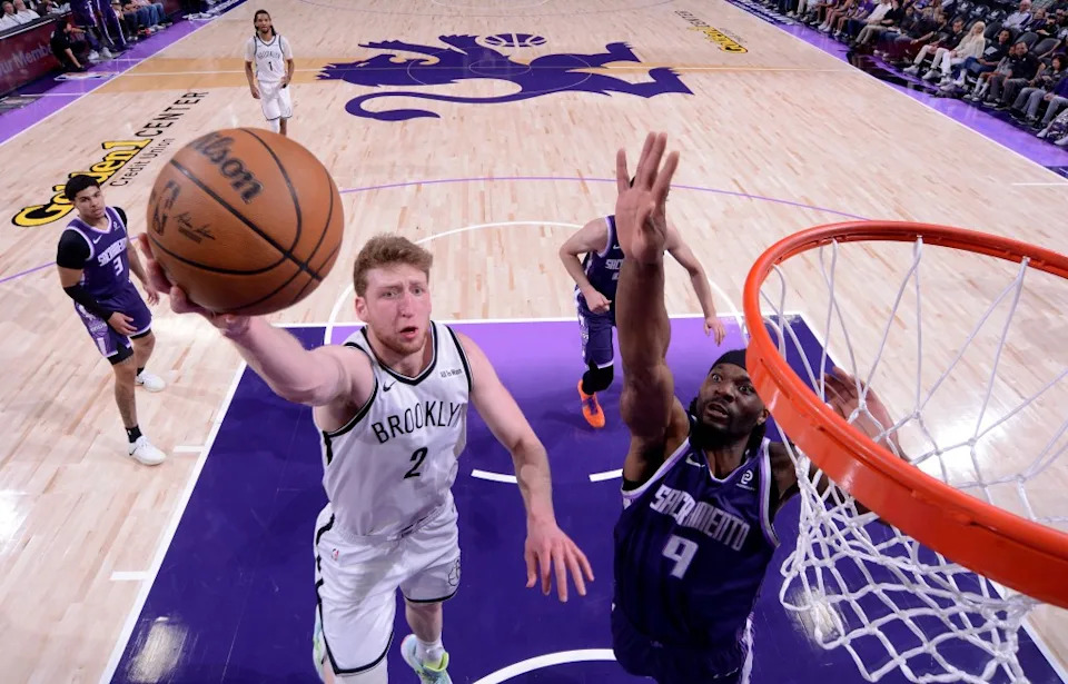 Danny Wolf the Brooklyn Nets drives to the basket during the game against the Sacramento Kings on March 22, 2026 at Golden 1 Center in Sacramento, California. NBAE via Getty Images