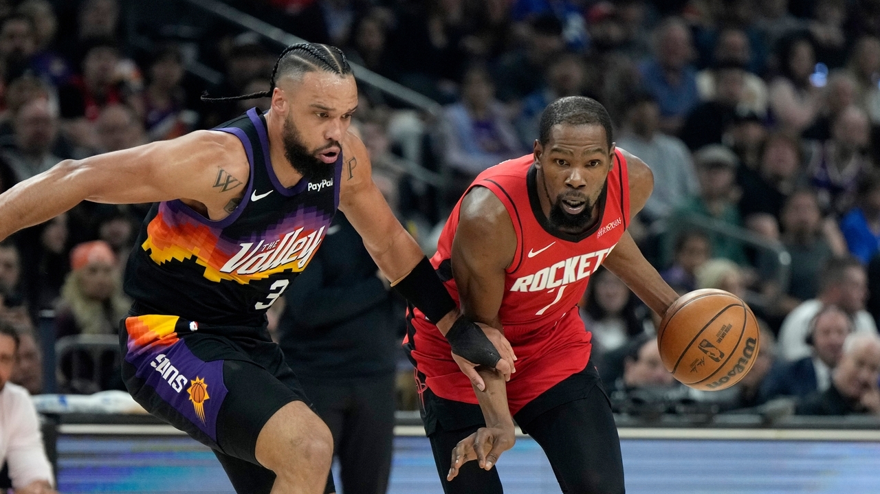 Kevin Durant's juke sends Dillon Brooks to the floor as Rockets rally past Suns for 7th straight win