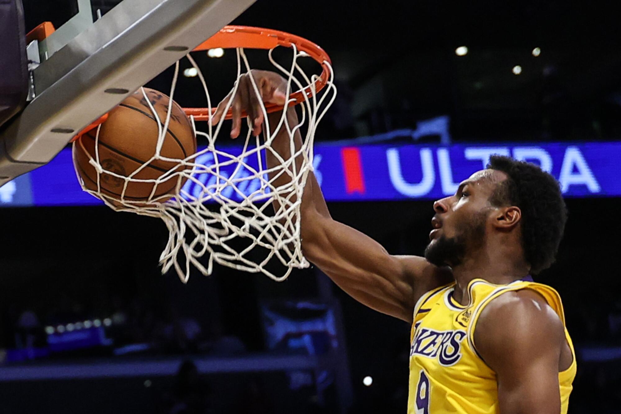 Lakers guard Bronny James dunks against the Thunder on Tuesday night at Crypto.com Arena.