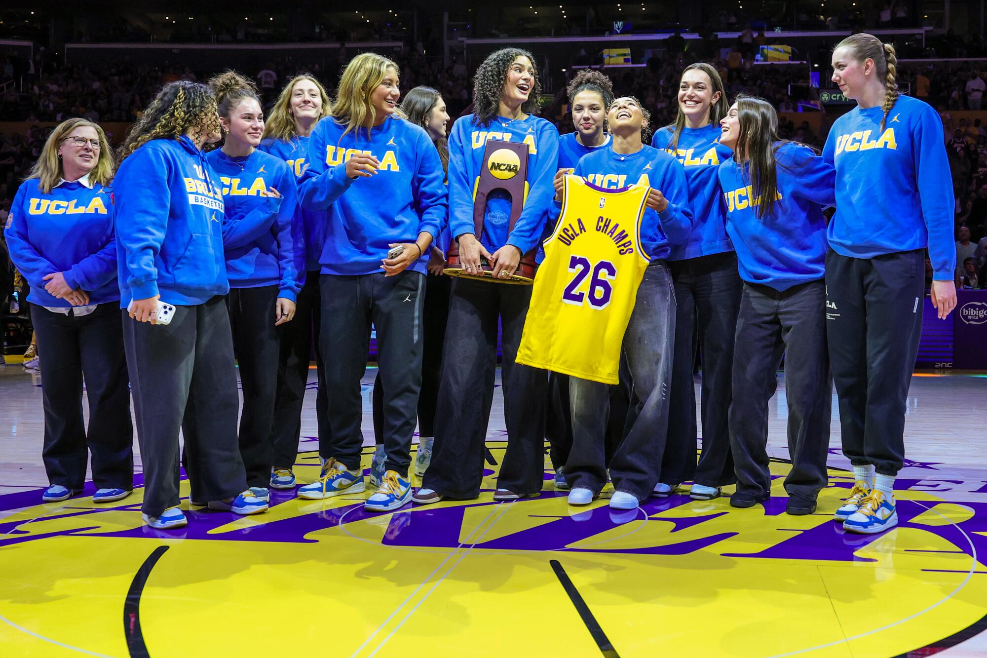 UCLA's NCAA championship-winning women's basketball team is honored during the Lakers-Thunder game.